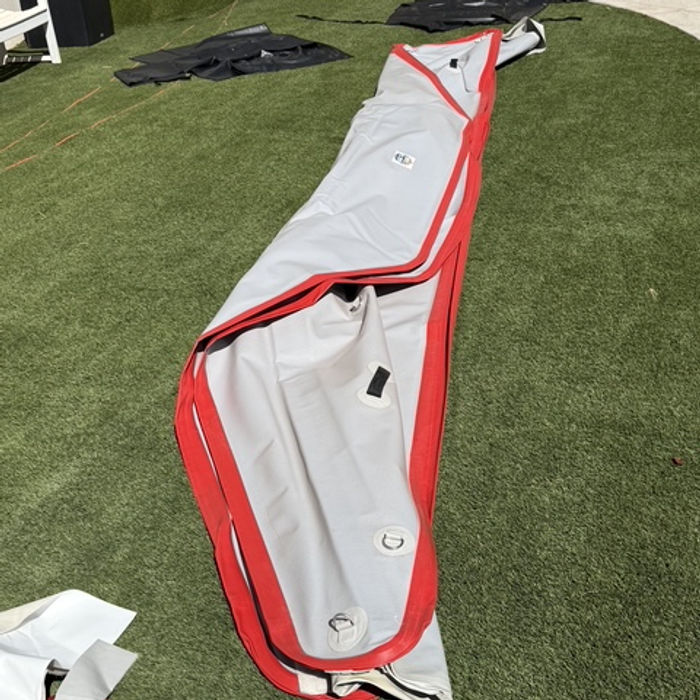 A Swole Slide section laid out on grass