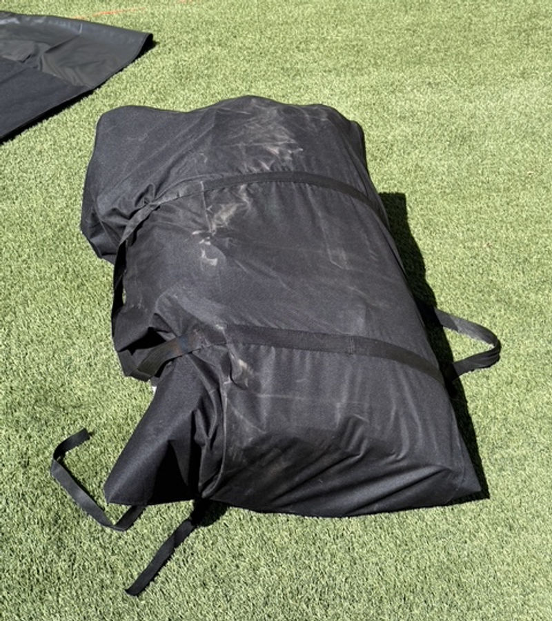 A Swole Slide packed in its carry bag